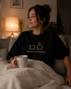 Black T-shirt with two bone-coloured coffee cups above the phrase “Still miss you sometimes.”